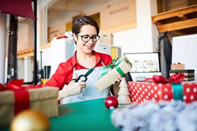 Woman wrapping gifts