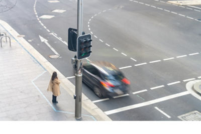 Office worker at an intersection.