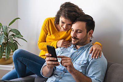 Couple using phone