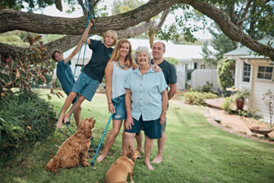 Leon, Sam, Lana, Gay and Chris in their backyard