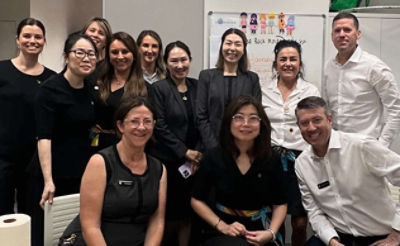 12 CBA staff members smiling