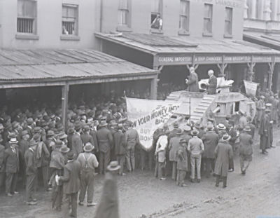 Denison Miller atop a tank in Sussex Street, Sydney, in April 1918 (Reserve Bank of Australia Archives)