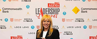 Suzie Betts holding Women's Agenda Leadership Award