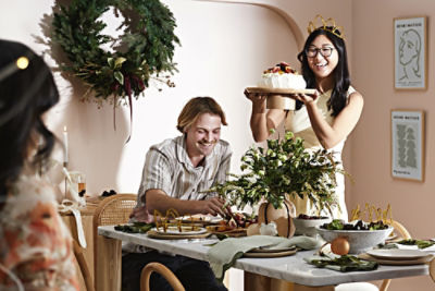 A couple sitting at table enjoying food