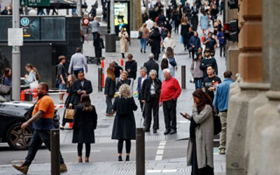 Auctioneer Jesse Davidson presides over a property auction in Homebush, in Sydney. Credit: AAP Image/Dan Himbrechts