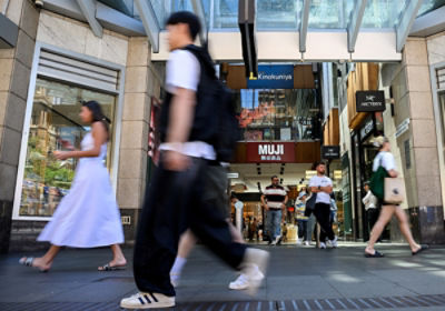 Person in meat aisle at supermarket. Credit: AAP Image