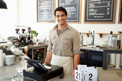 Man working in cafe