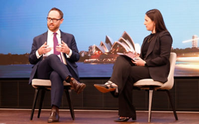 Auctioneer Jesse Davidson presides over a property auction in Homebush, in Sydney. Credit: AAP Image/Dan Himbrechts