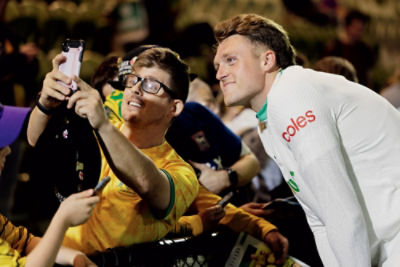 Harry Souttar posing for a photo with a fan.