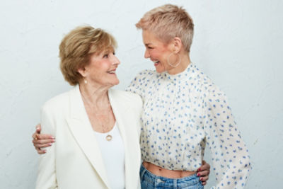 Penelope and Jessica Rowe with their arms around each other.