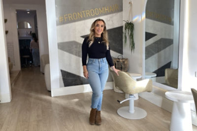 Woman standing in a hair salon