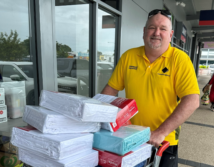 David Richards, Townsville Branch Manager, collects linen donations for the Ingham community