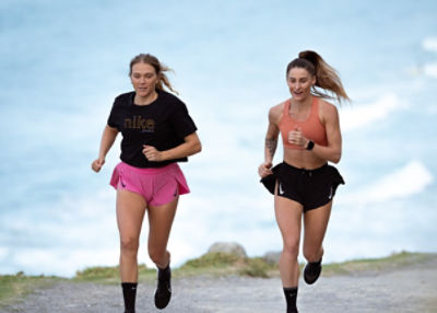 Lydia O'Donnell and Esther Keown, Co-Founders of Femmi, running together