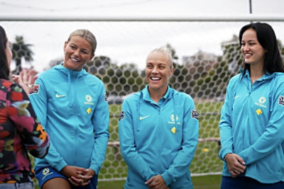 CommBank Matildas' players Tameka Yallop, Amy Sayer and Sophie Harding on the field