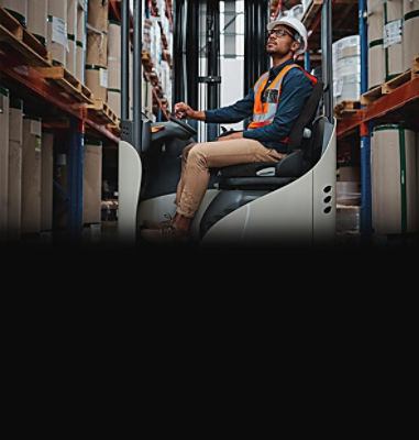 Man driving forklift