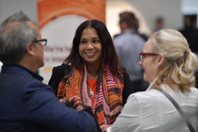 Supply Nation photo of three people standing and talking