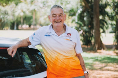 Learn IT’s Murray Holm standing beside a car.