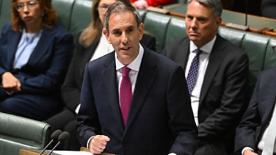 Australian Treasurer Jim Chalmers delivers the 2026-27 Federal Budget in the House of Representatives at Parliament House in Canberra, Tuesday, May 12, 2026. (AAP Image/Lukas Coch) 