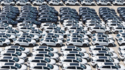 New energy vehicles await shipment at Shanghai Port's automobile export terminal in east China's Shanghai, 14 April 2026. (Photo by Imaginechina/Sipa USA)