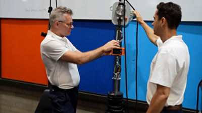 CPR Facade Upgrade Specialists Founder Mark Smith inspecting a motorised rope ascender. Image: Supplied. 