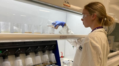 University of Queensland researcher Jess Cartwright during the development of the Kakadu plum drink. Credit: AAP