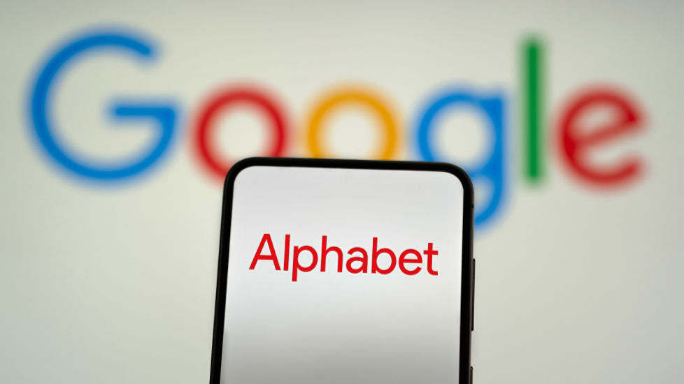 Alphabet plunge drags Wall Street lower