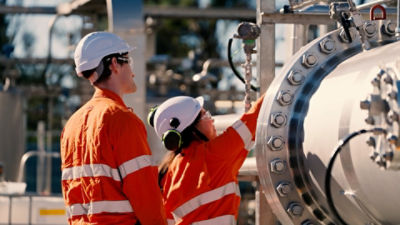 Two Hysata engineers work on a hydrolyser. Image: supplied