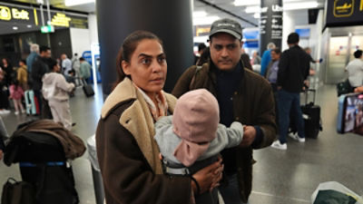 Travellers from the Middle East arive in London.
