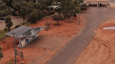 Aerial view of remote outback service station with electric vehicle charging infrastructure in Australia. Picture Adobe Stock