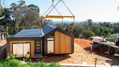 The prefab home of Perth couple Mark Radford and Gordon Shorrocks being installed onsite. Picture: Supplied.