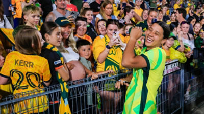 Sam Kerr of the Matildas poses for photos and signs autographs during the International Women's Friendly match between between Australia and New Zealand at Polytec Stadium in Gosford, Friday, November 28, 2025. (AAP Image/Mark Evans)