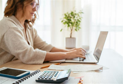 Woman sitting at a computer
