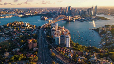 Aerial drone view of Sydney City and Sydney Harbour showing Sydney Harbour Bridge and Lavender Bay in the late afternoon Credit: Adobe Stock