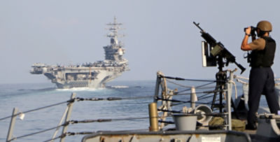 The aircraft carrier USS Dwight D. Eisenhower and other warships crosses the Strait of Hormuz into the Persian Gulf on Sunday, Nov. 26, 2023. Picture: US Navy