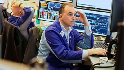 Christopher Lagana works on the floor at the New York Stock Exchange in New York, Monday, March 2, 2026. (AP Photo/Seth Wenig)