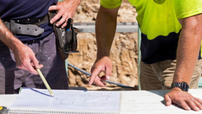 Tradies working on construction site