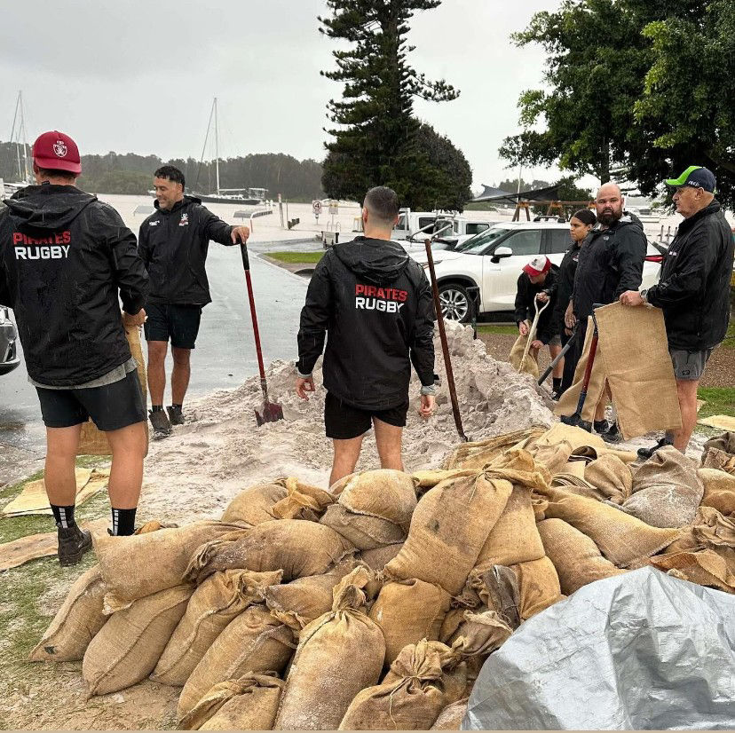 Port Macquarie Pirates Rugby Club members filling sandbags