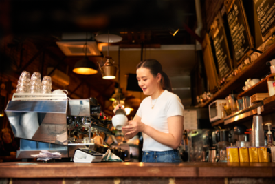 Woman working in cafe