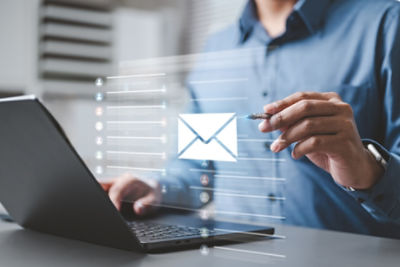 Image of someone using a keyboard with warning signs.