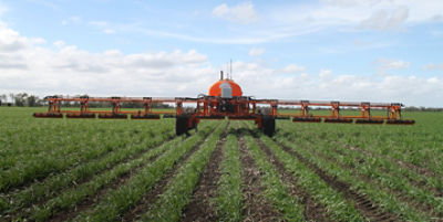 An autonomous swarmfarm piece of machinery working on a crop. Credit: Swarmfar