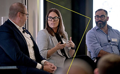Panellists Andrew Pade, Leah Pinto, and Ethan Teas in discussion.